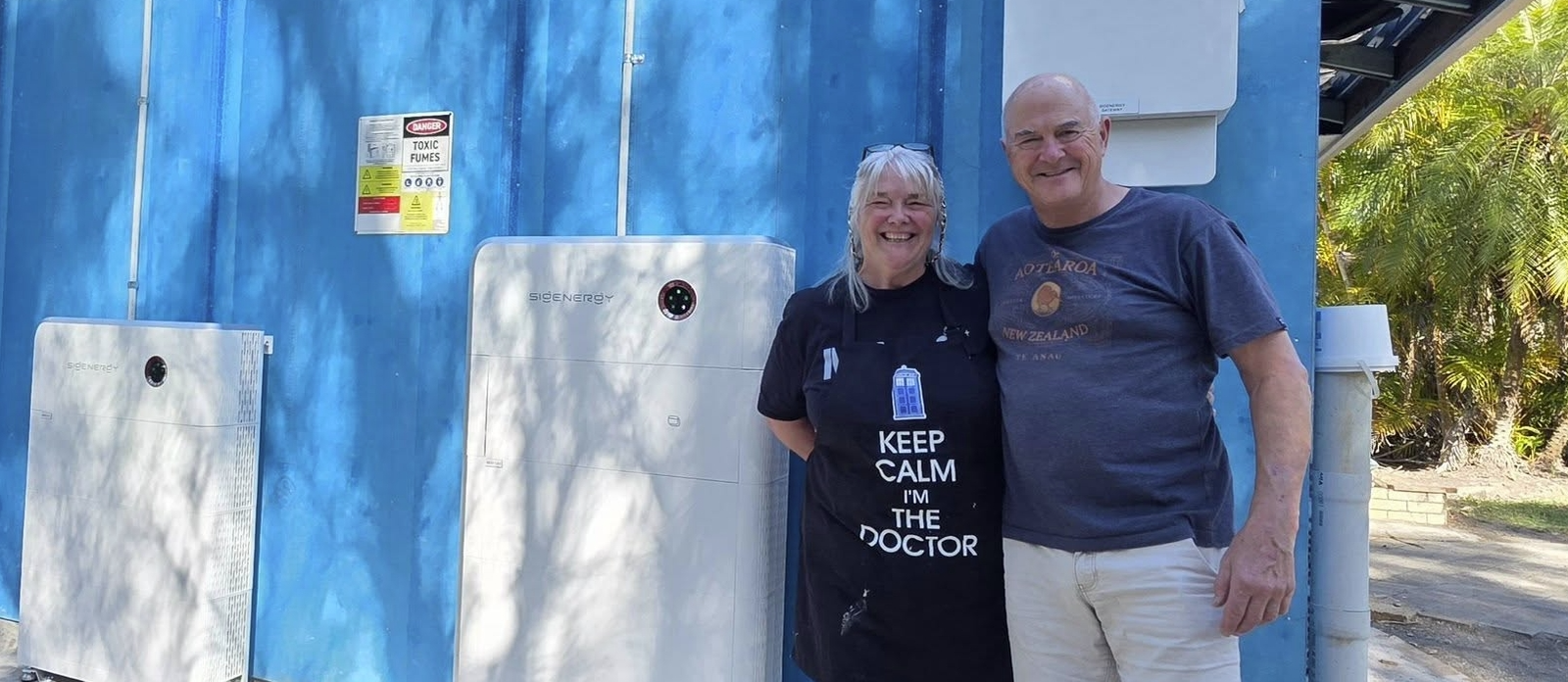 Happy customers with their Sigenergy system and EV charger